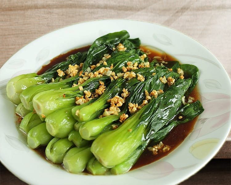 Can dogs eat bok choy that is seasoned?